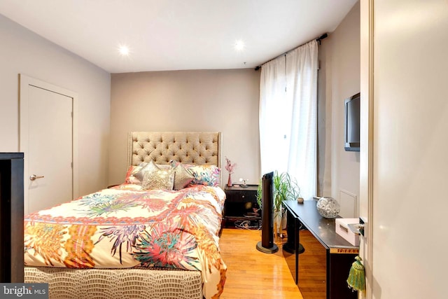 bedroom with light hardwood / wood-style flooring