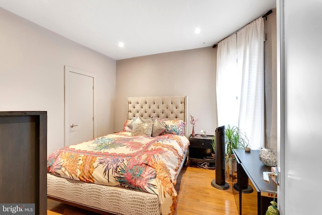 bedroom featuring light hardwood / wood-style flooring