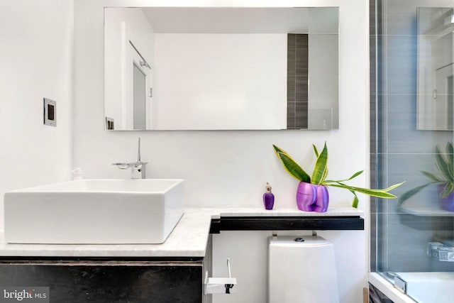 bathroom featuring vanity and walk in shower