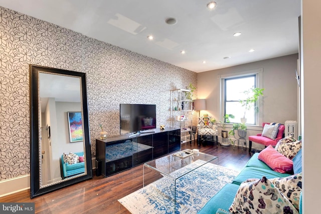 living room with dark wood-type flooring and radiator