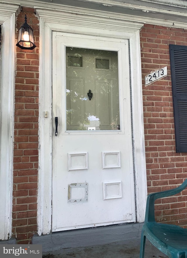 2413 Iverson St, Temple Hills, MD 20748 - view of exterior entry featuring brick siding