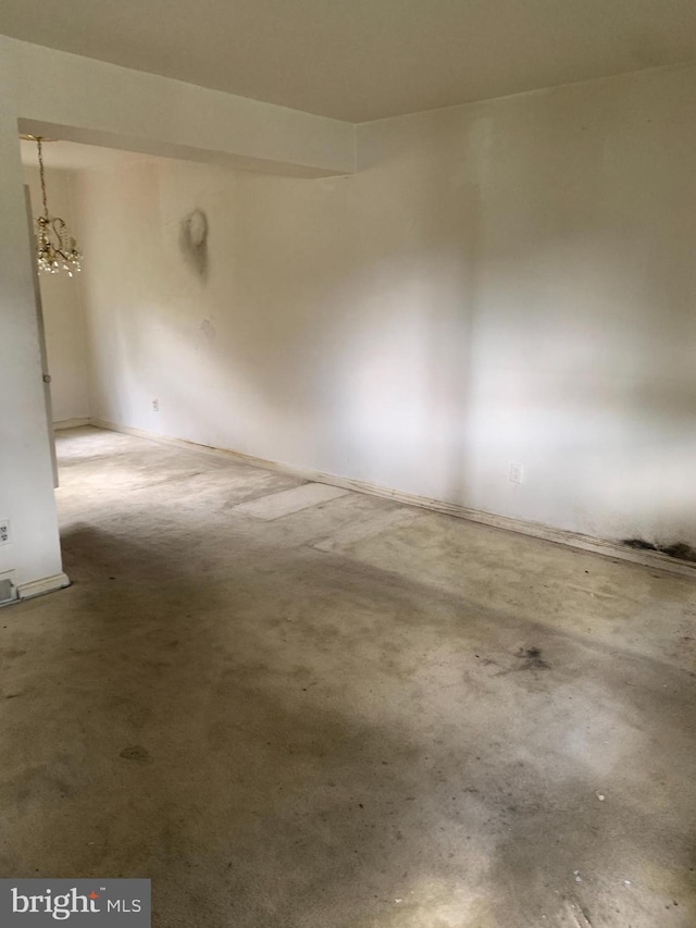 2413 Iverson St, Temple Hills, MD 20748 - unfurnished room featuring a chandelier