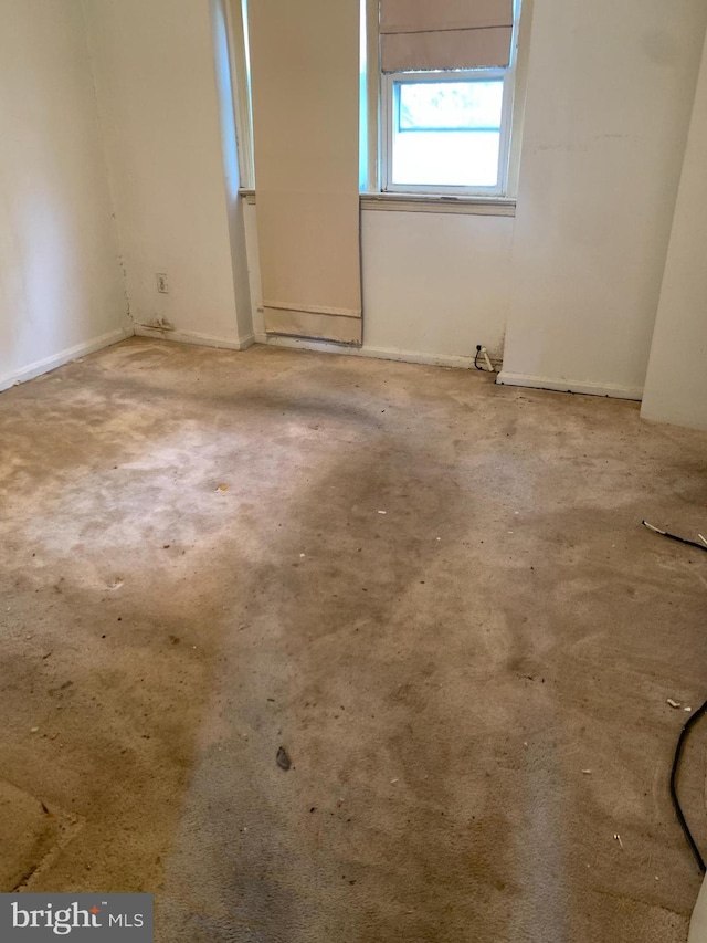 2413 Iverson St, Temple Hills, MD 20748 - spare room with concrete floors