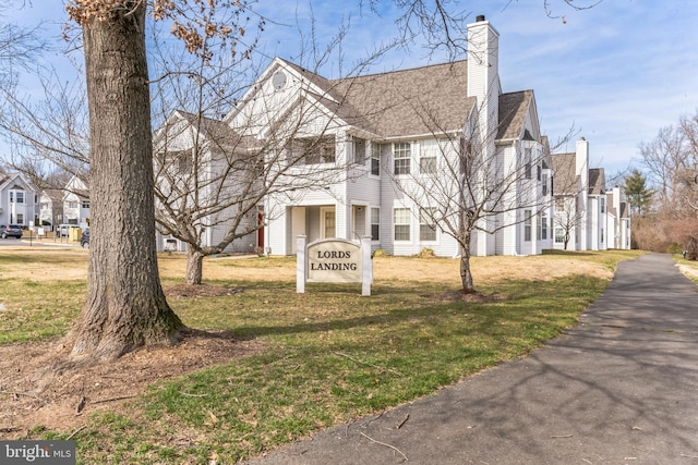 view of front of house with a front lawn