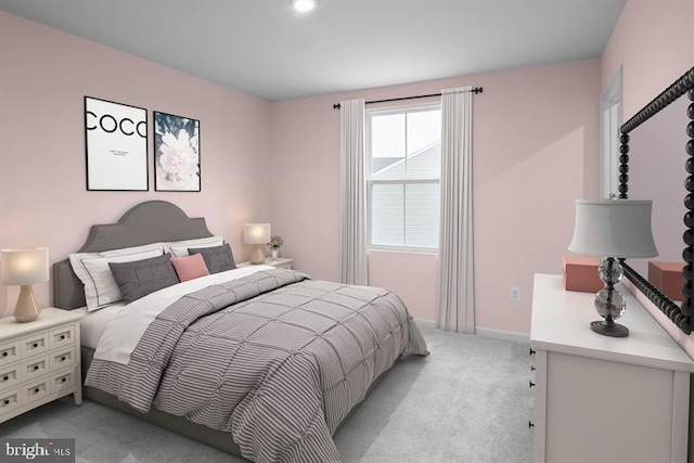 bedroom with light colored carpet