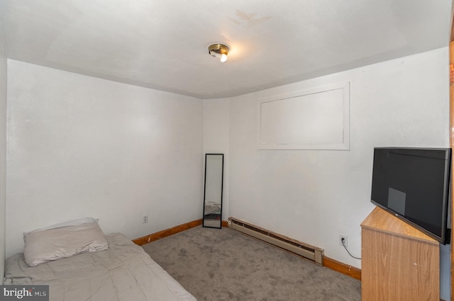 carpeted bedroom with a baseboard radiator