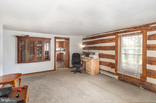 office featuring a baseboard heating unit and carpet floors