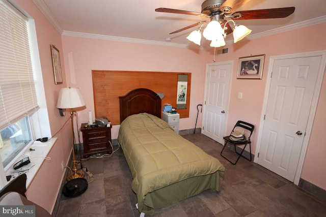 bedroom featuring ceiling fan and crown molding