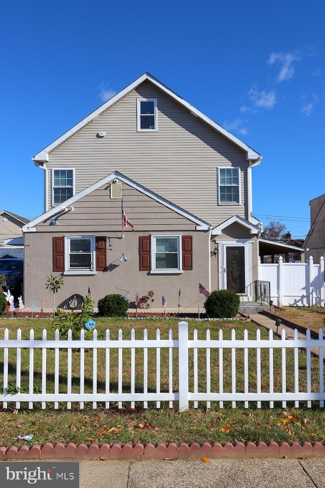 view of front of house with a front yard