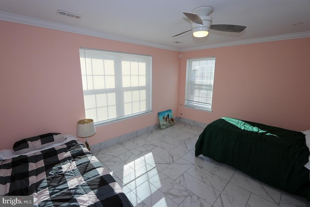 bedroom featuring ceiling fan and crown molding