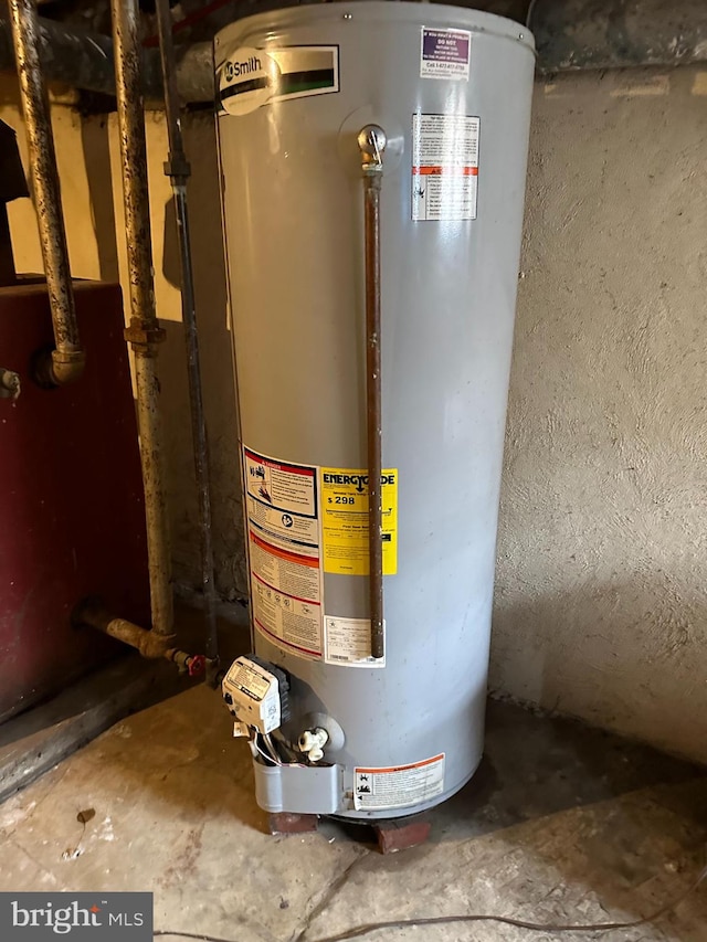 utility room with water heater