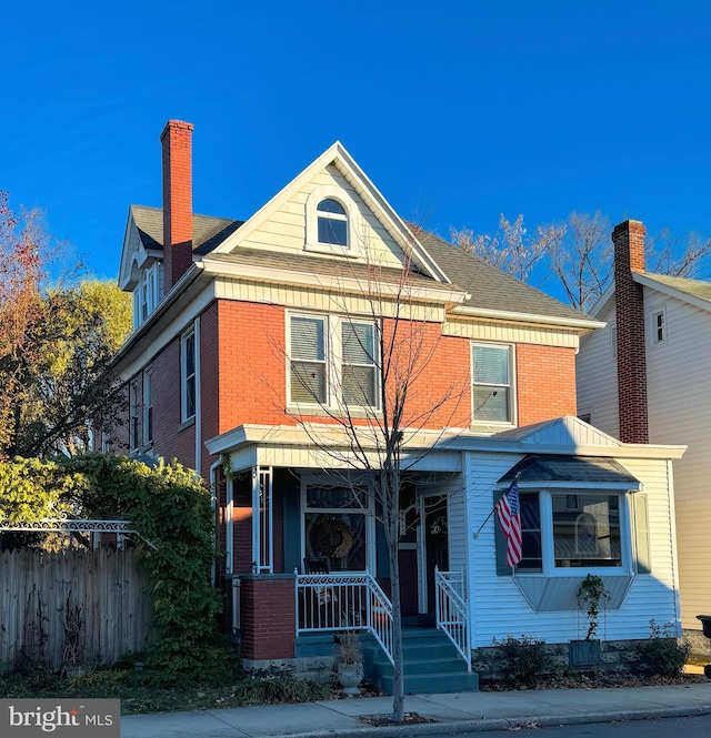 view of front of property featuring covered porch