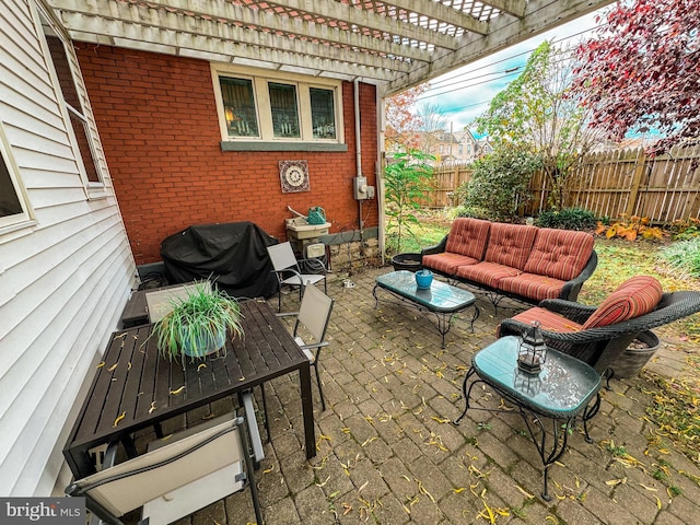 view of patio / terrace with outdoor lounge area, a pergola, and grilling area