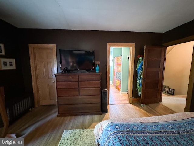 bedroom featuring wood-type flooring