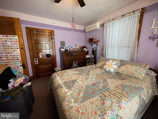 bedroom with dark carpet, an AC wall unit, and ceiling fan