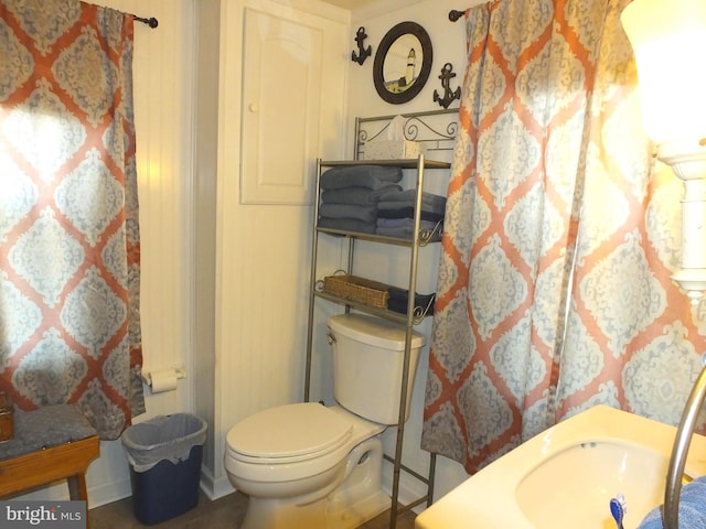 bathroom featuring toilet