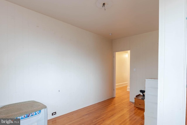 spare room featuring light hardwood / wood-style floors