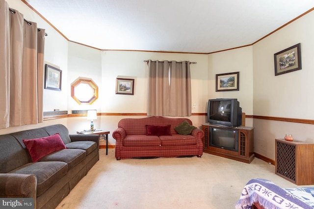 carpeted living room featuring crown molding