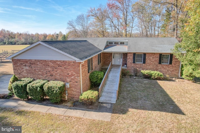 view of front of property with a front lawn