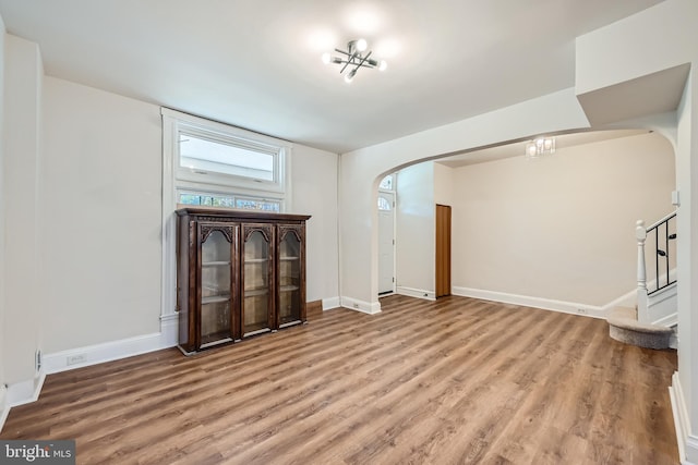 unfurnished living room featuring light hardwood / wood-style flooring