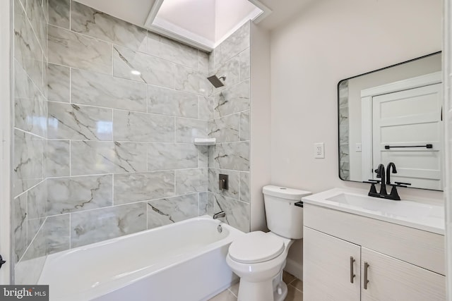 full bathroom with tiled shower / bath, vanity, and toilet