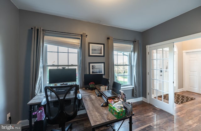 office space featuring french doors and dark hardwood / wood-style floors