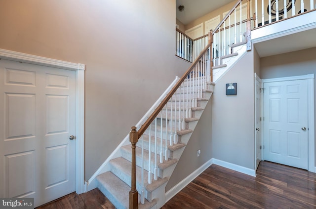 stairs with wood-type flooring