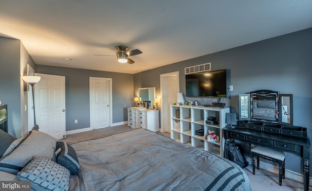 carpeted bedroom featuring ceiling fan