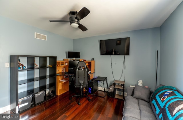 office with ceiling fan and dark hardwood / wood-style flooring