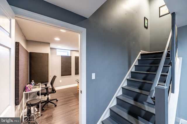 stairway with wood-type flooring