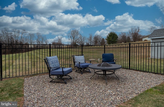 view of patio featuring an outdoor fire pit