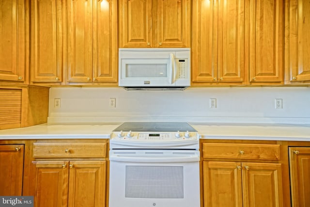 kitchen with white appliances