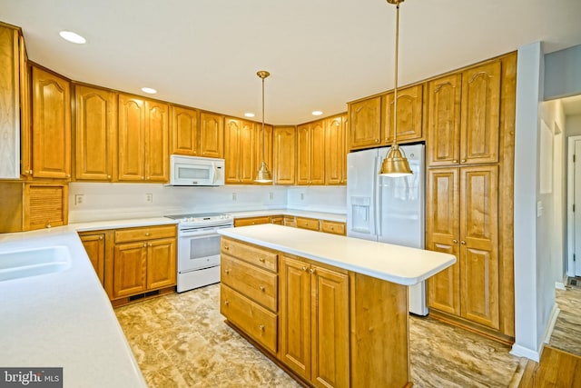 kitchen with sink, hanging light fixtures, light hardwood / wood-style floors, white appliances, and a kitchen island