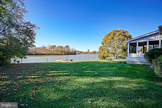 view of yard with a water view