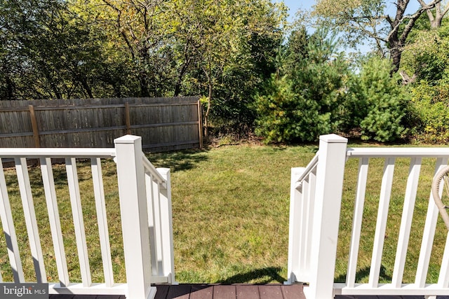 view of yard featuring a wooden deck