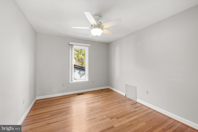 unfurnished room featuring ceiling fan and light hardwood / wood-style flooring