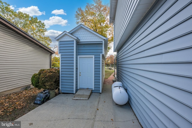 doorway to property with a patio area