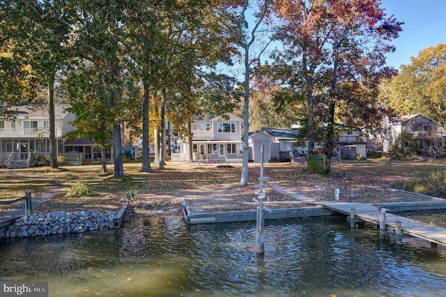 dock area with a water view