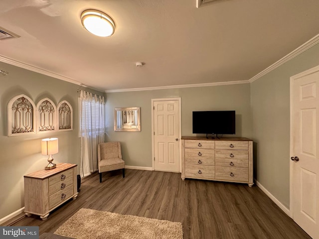 sitting room featuring ornamental molding and dark hardwood / wood-style flooring