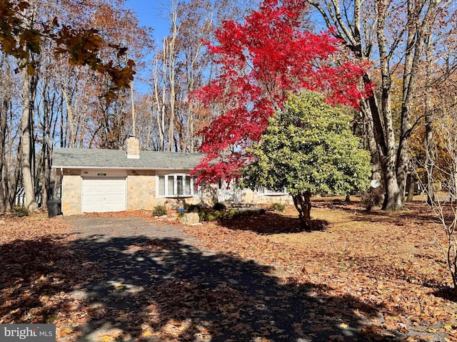 exterior space with a garage