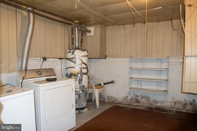 clothes washing area with independent washer and dryer