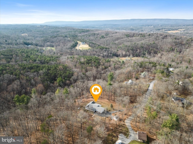 drone / aerial view featuring a mountain view