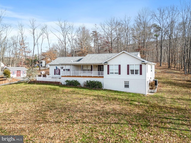 view of front facade featuring a front lawn and a porch