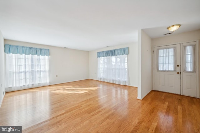 entrance foyer featuring light hardwood / wood-style flooring