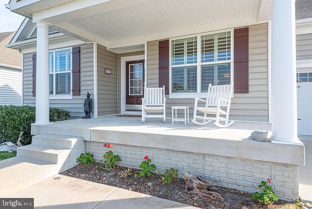 entrance to property with covered porch