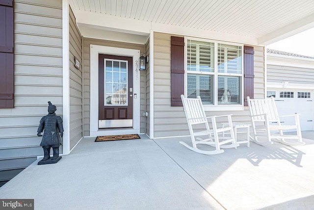 entrance to property with covered porch