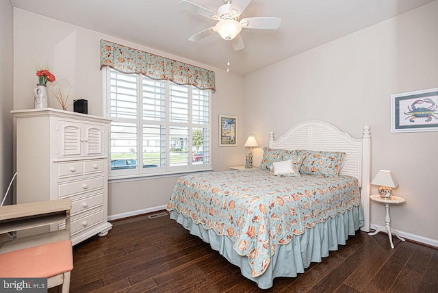 bedroom featuring ceiling fan and dark hardwood / wood-style flooring