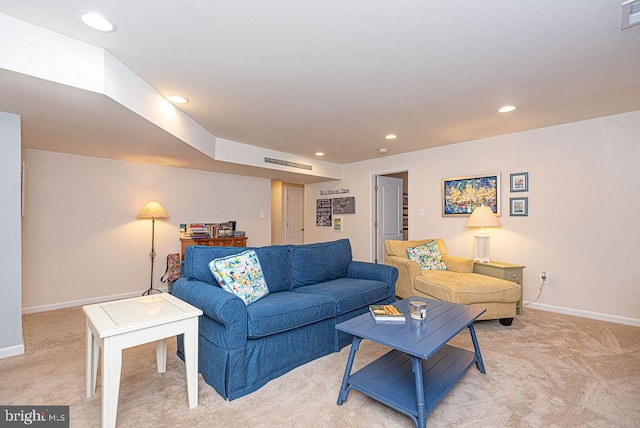 living room featuring light carpet