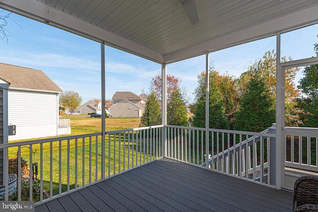 unfurnished sunroom with plenty of natural light