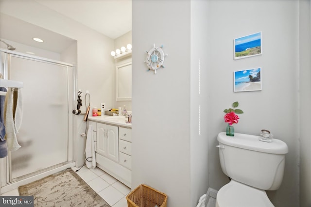 bathroom with toilet, an enclosed shower, vanity, and tile patterned floors